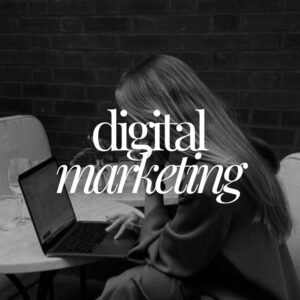 Black-and-white image of a woman working on a laptop with digital marketing text overlay, representing digital marketing strategy and online business.